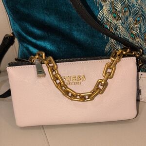 GUESS Light Pink Wristlet with Gold Chain